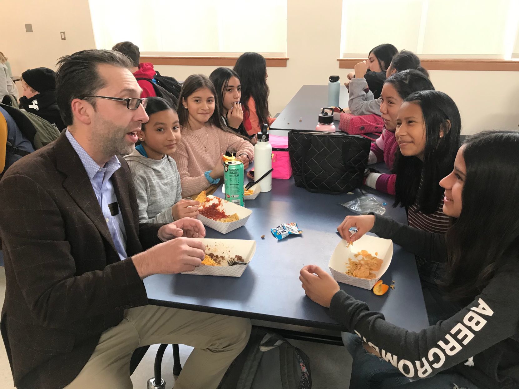 RMS principal and students at lunch
